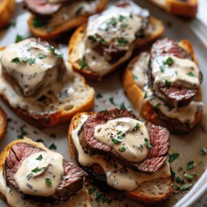 Beef Tenderloin Crostini With Parmesan Cream Sauce Recipe